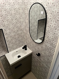 Under stairs toilet and vanity